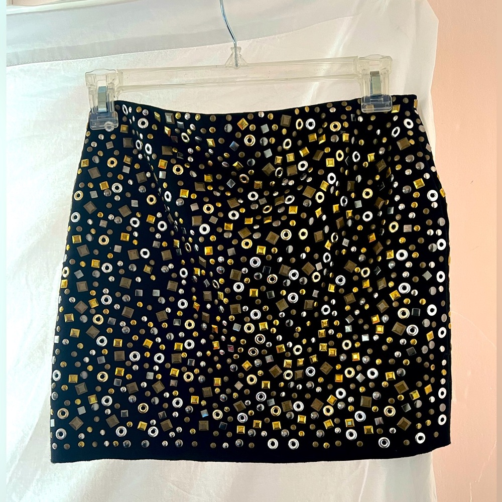 Bailey 44 Studded Mini skirt with gold and silver studs and thick black fabric